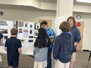 As part of their writing curriculum, The Legacy School’s 8th graders researched careers, created poster boards, presented on their chosen career, practiced public speaking, and fielded questions from students connecting school to real-world career paths.