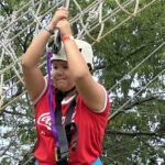 A student at The Legacy School plays on the ropes course at Kids After Hours at Red Barn Ranch