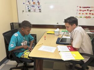 Student at The Legacy School works one-on-one with tutor
