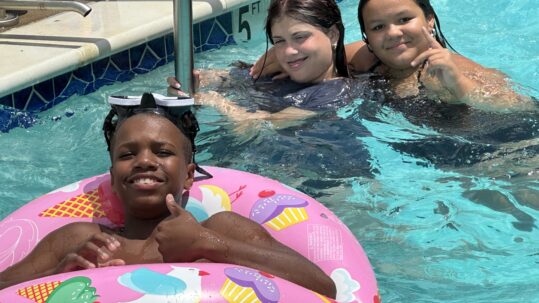 Students at Camp Terrapin at The Legacy School play in the on-campus pool