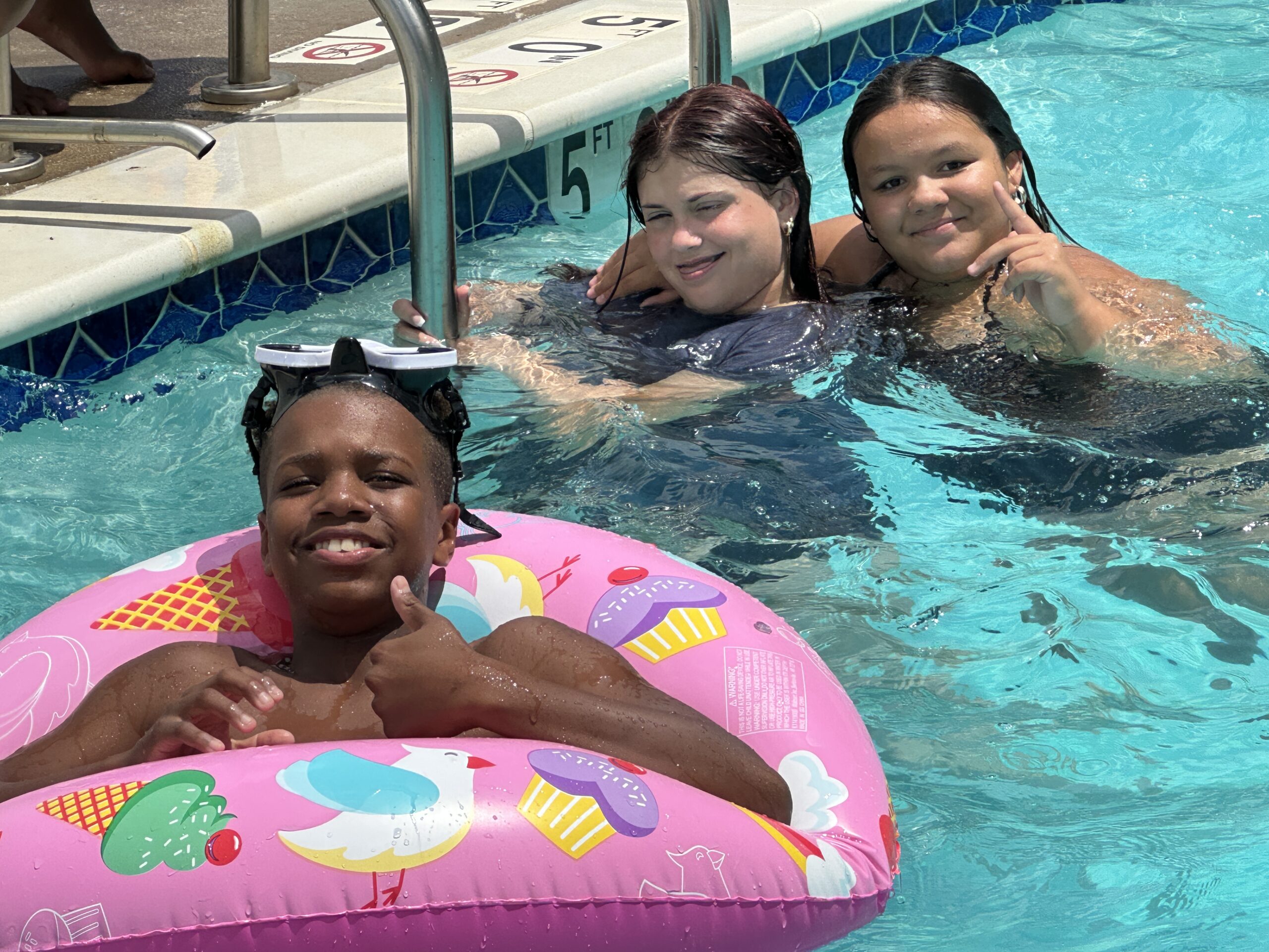 Students at Camp Terrapin at The Legacy School play in the on-campus pool