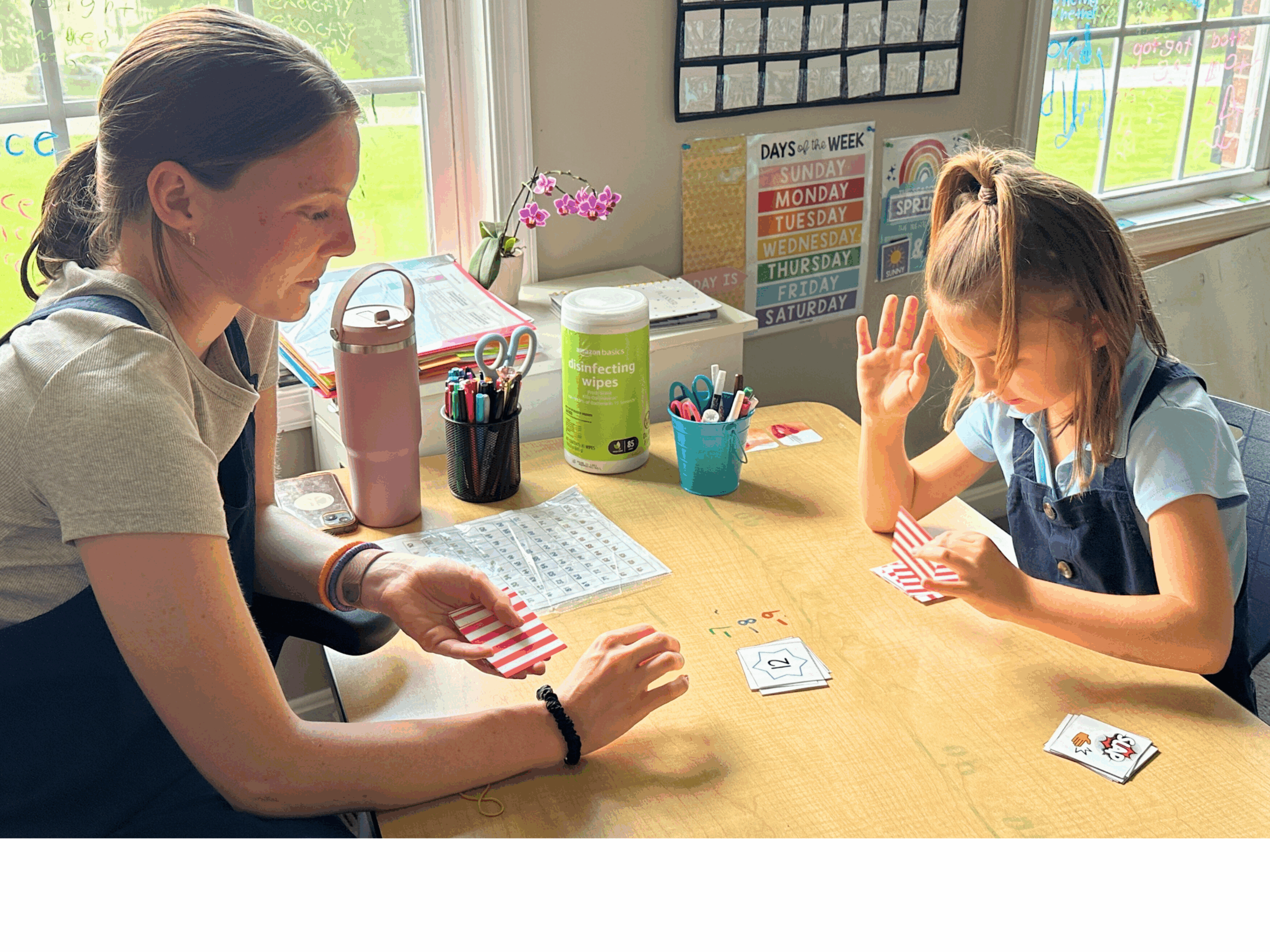 Copy of IMG_6369-EDITED (Ms. Dani and Primary Student).jpg A Primary School teacher works with a student.